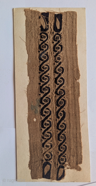A Coptic textile band with very intriguing negative space                        
