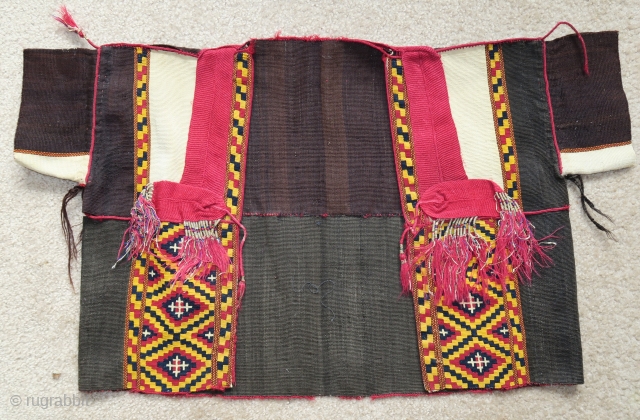 Assyrian jacket, eastern Syria or perhaps northern Iraq. Great condition, natural colors and using portions of metal thread. A fabulous ethnographic piece.           