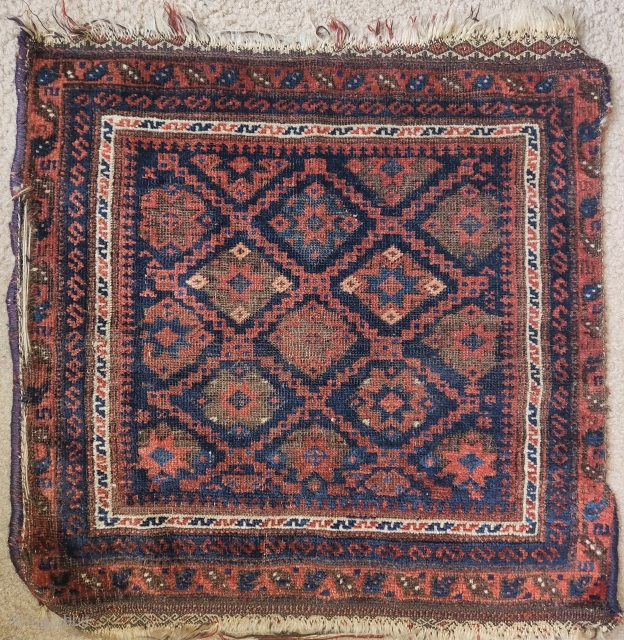 Baluch bagface, very fine weave, floppy handle, silk highlights (dyed with faded fuchsine) 1'10"x1'10"                   