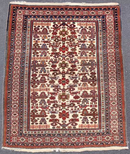 Kuba Perepedil rug, white ground, great condition.                          