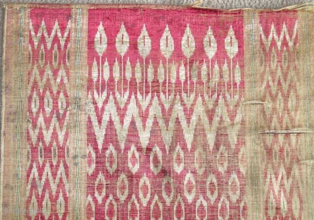 Persian Silk Velvet Ikat Fragments, very antique with at least four insect reds, green, yellow on a cotton foundation (sizes= 22"x23" and 18"x23" / 56x58cm and 45x58cm)      