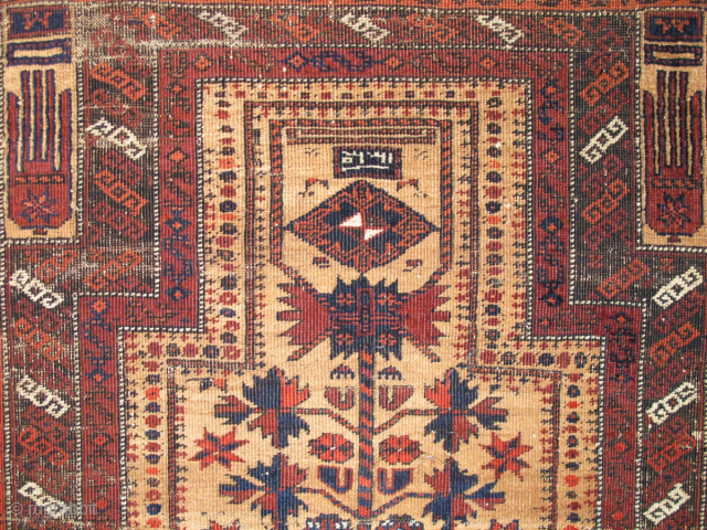 Crisply drawn Camel Ground Baluch Prayer Rug with elongated stylized hands, depressed warp Khorosan type. Dated Baluch prayer rug, a piece from Basha's Baluch Collection. 2'7"x4'7"