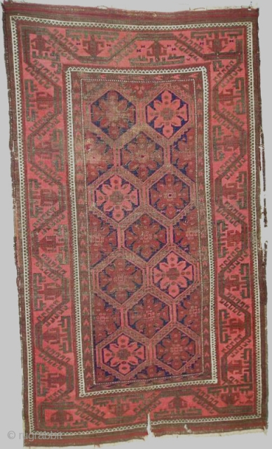 Antique Baluch Rug with rosettes in a lattice. All narural colors. 89x 152 cm(35''x60'' inches)
                  