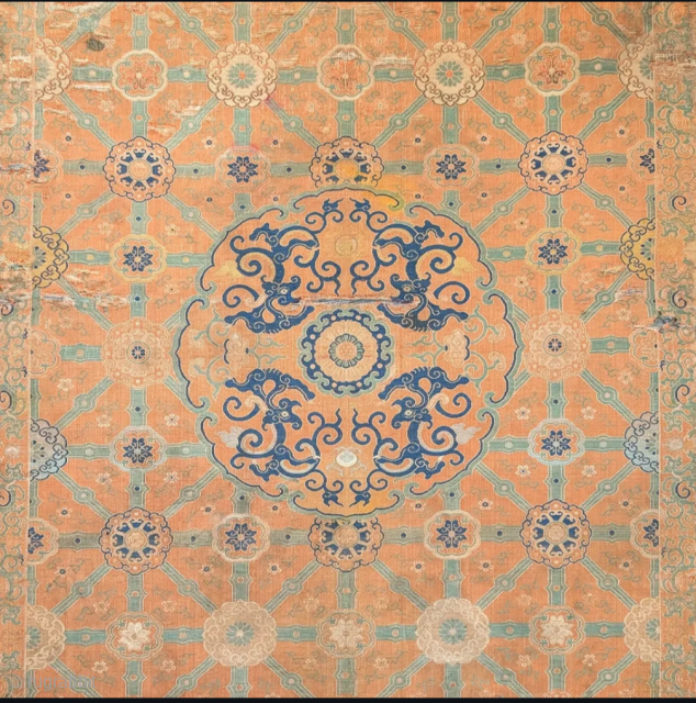 Silk chair cover fragment with a foliate-dragon
medallion, about one quarter of the total piece China, 17th/18th century,Kangxi or Qianlong period