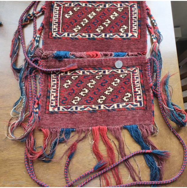 Pair of small Yomud torbas complete with original backs, chords, and tassels. All natural color. Excellent condition!                