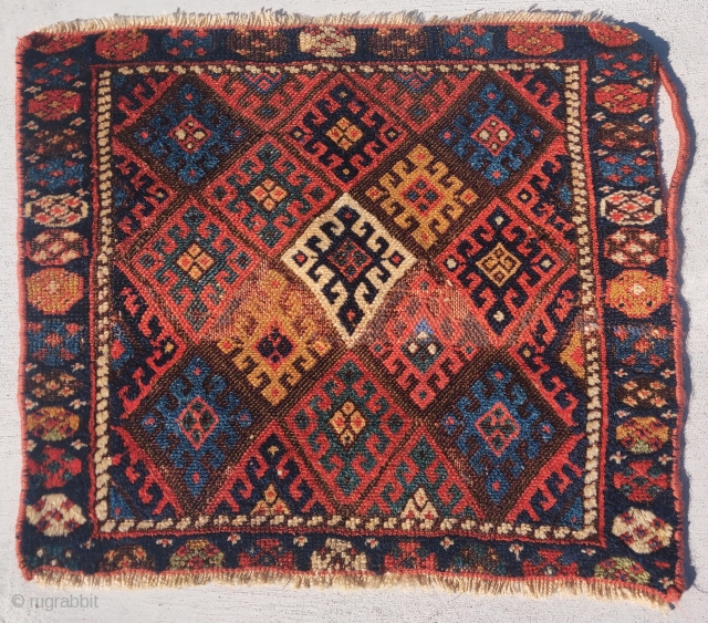 Jaf Kurd bagface, 24"x21, soft lustrous wool and saturated color with a single white elongated diamond in the center. There is a narrow band of old repair in the field which could  ...