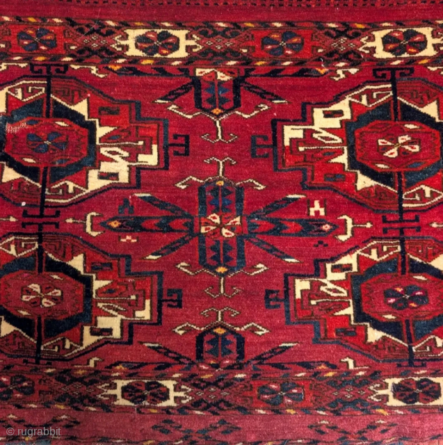 Six gul Tekke torba with large chemcheh minors. Velvet Tekke wool, back still attached, some highlights with silk pile.