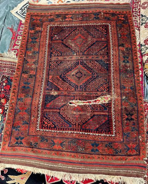 Smaller Baluch main carpet with a "Mushwani" design. Good age and patina, rip in field, fantastic color, paired animals, a nice older example from Western Afghanistan