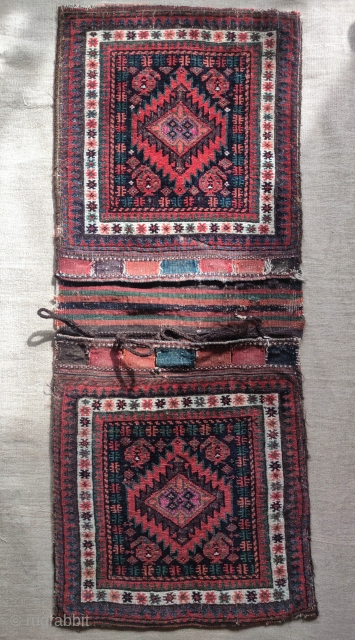 Baluch complete double saddle bag set, a small khorjin or possibly a chanteh set? Sistan area. Silk pile highlights in the center of each bag face. All natural dyes, great wool with  ...