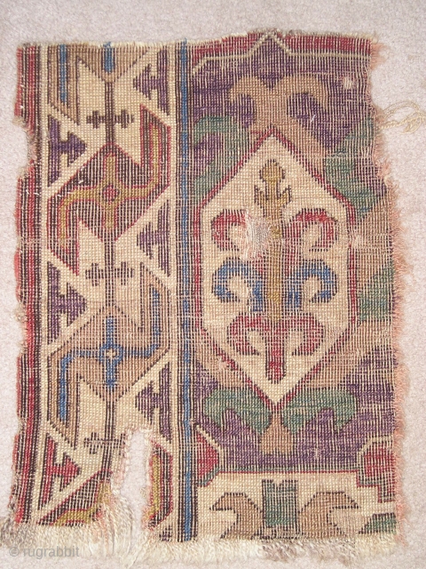Caucasian Blossom or Dragon Carpet Fragment. Great purple and green and very graphic border (2'0'' x 1'5'')                