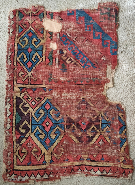 Konya rug fragment, circa 1800 or perhaps earlier? Excellent aubergine.                       