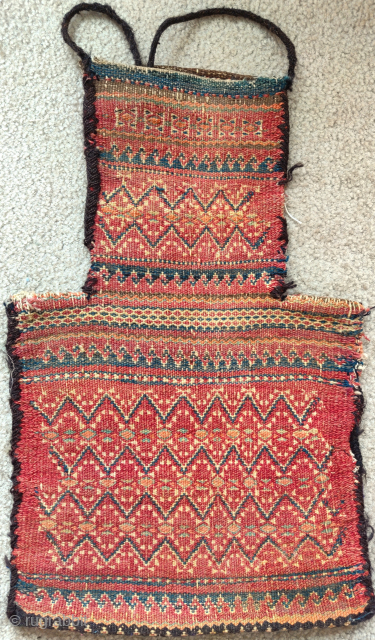 Baluch double-sided flatwoven salt bag, tribal region, Northwest frontier, an old one with great color and execution, old repair in one side at the edge of the neck which itself is probably  ...