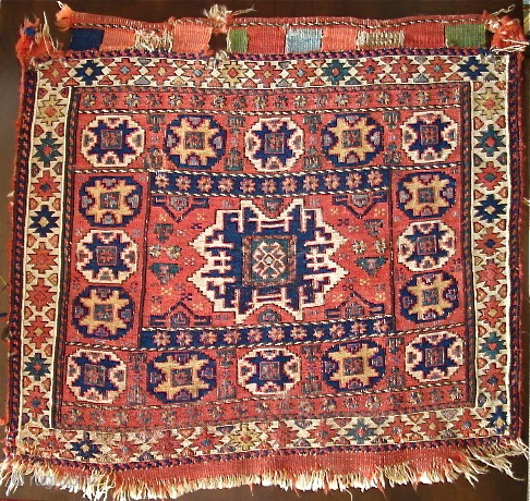 Shahsevan Sumak Bagface with a Leshghi Star Design, Old, Colorful, Thin, Beautiful. Difficult to accurately photograph. a small bit of silver thread in the center. 24"x26"       