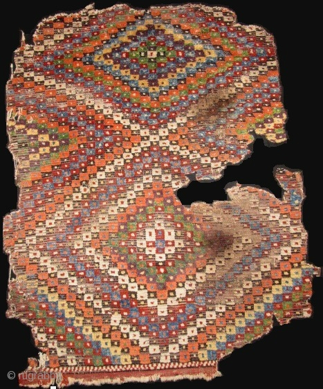 Anatolian eye-dazzler yatak with fantastic color. Probably Kuthaya region. fragmented. mounted and conserved on black backing. 155x130cm                