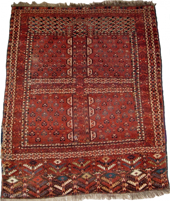 Turkmen Yomud Ensi, super soft wool, saturated color with camel wool. finely woven with asymmetrical knot open right. portions of side and selvedge missing but stabilized by patch. 125x175cm    