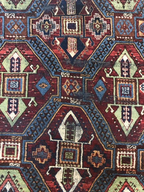 Kurdish rug, iconic design. Worn but classic. Not super old, but an authentic tribal piece.                  