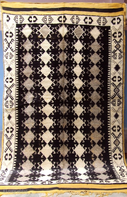 Rf 71- Ait Ouaouzguite Berber rug ( Ait Znaga north ), natural wool colour in black-white, 327 x 138 cm, circa 1950-55.           