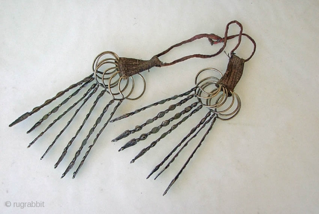 Pashtun Head Ornament, was worn either on the head or as a necklace.
Each of the 14 pieces is 19cm long and is made from metal with a low silver content.Afghan/Pakistan Border Region.  ...