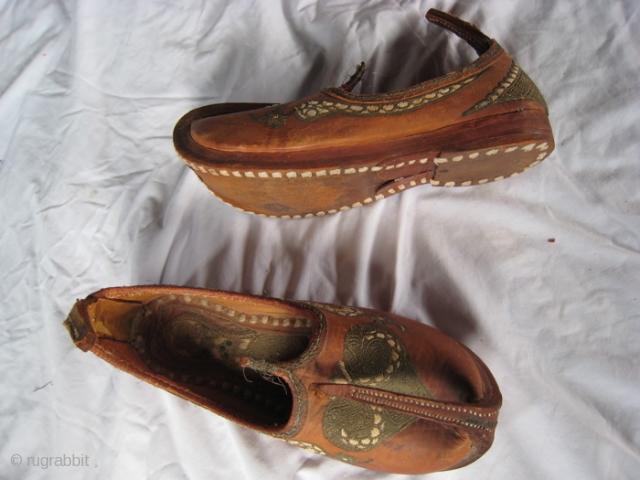 Pathan or Pushtoon shoes.  Hand made, embroidered leather shoes from Peshawar, NWFP, Pakistan.  Rarely worn.  Size 10 men's.  Heavy soles,  Curled toe and heel tab.  Made  ...