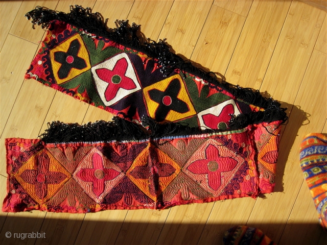 Uzbek Suzani border fragment.  55 inches long, 7 inches wide.  Pieced and sewn, 4 inches, 12, 10 and 30 inches. Fringe 2 inches.  Tight bright embroidery.    