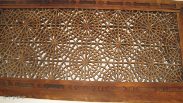 Wood ventilation window covering from the old city of Peshawar.  Nails in the frame, but the center is made of tiny pieces of wood held together by pressure and balance.   ...