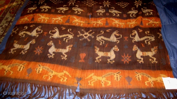 Sumba Indonesia Ikat, 53 inches by 90 inches.  Design of geese and prancing animals.  Purchased in 1977 in Sumba.  Stiff fabric.         