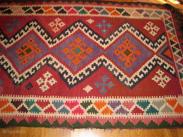 Afghan kilim, thick, all wool.  54 inches by 138 inches.  Pink dye in border design element has run slightly.  No holes, repairs.  Fringe on both ends.   