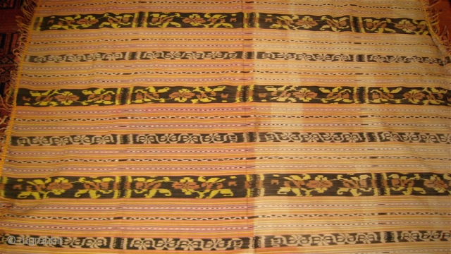 Timor cloth, faded color stripes and ikat stripes.  Purchased in West Timor in 1976.  No holes or repairs.             