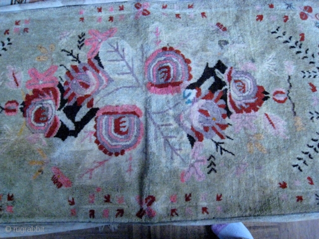 Chinese Turkestan double bag.  Wool pile on cotton base.  Back heavy woven cotton.  30 by 60 inches.  Unusual red rose on pale green design.     