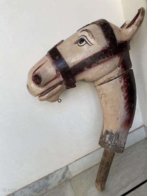 Wooden Horse Head from Central India.

A painted wooden horse dancing Head with an articulated jaw. The head is worn through use but still shows its typical trappings.

The Head represent deities, animals, birds  ...