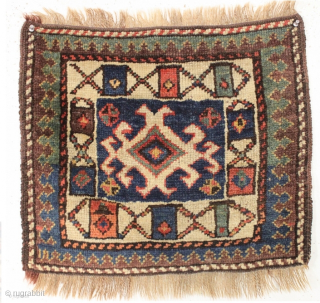 Persian bagface. Hard to place this one -- punt and say: Kurdish? Overall nice design with an unusual main border.  A smaller piece that reads well from a distance.  Very  ...