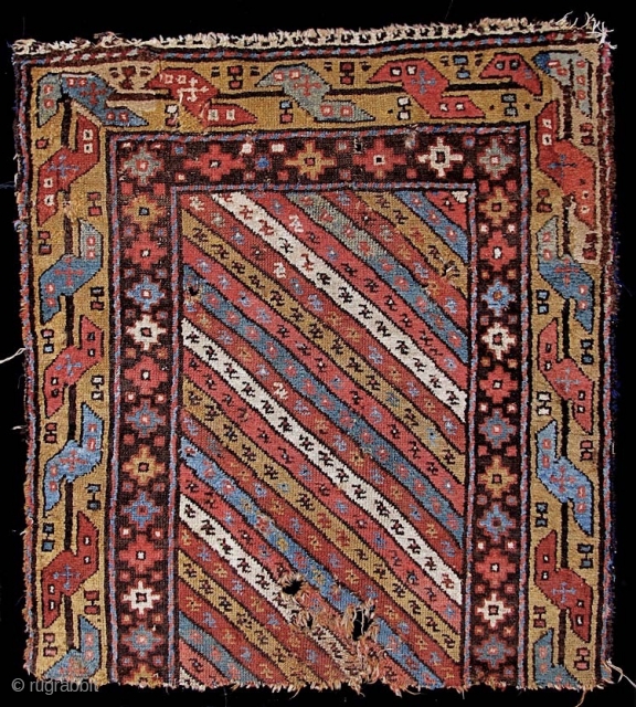 SHAHSAVAN, fragment of pile rug.  42 inches by 38 inches (107 cm x 97 cm).  Good pile, especially toward the sides--- pile is shorter in the lower center where there  ...