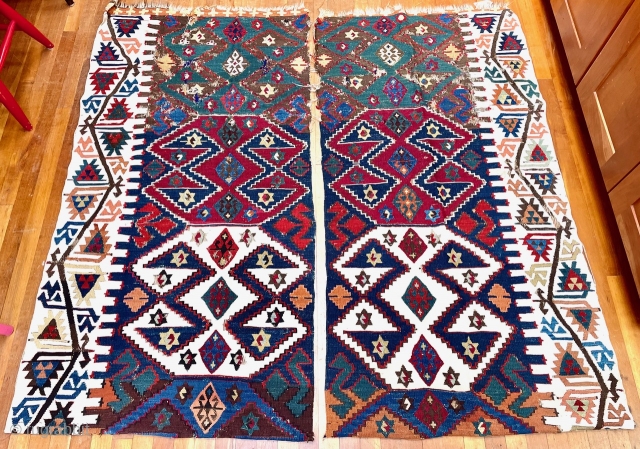 Two large fragments of an antique (19th C) Anatolian kilim. Each is approximately 65” x 33” (165 cm x 84 cm).  Kilims like this were woven in two long, narrower halves,  ...