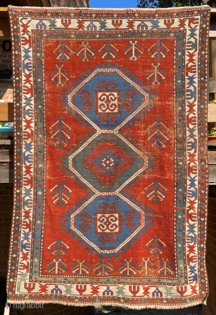 An attractive late 19th Century 3-medallion Kazak.  Generous size—86” x 58” (219 cm x 147 cm).  Some decent pile in borders to low pile over most of the field, with  ...