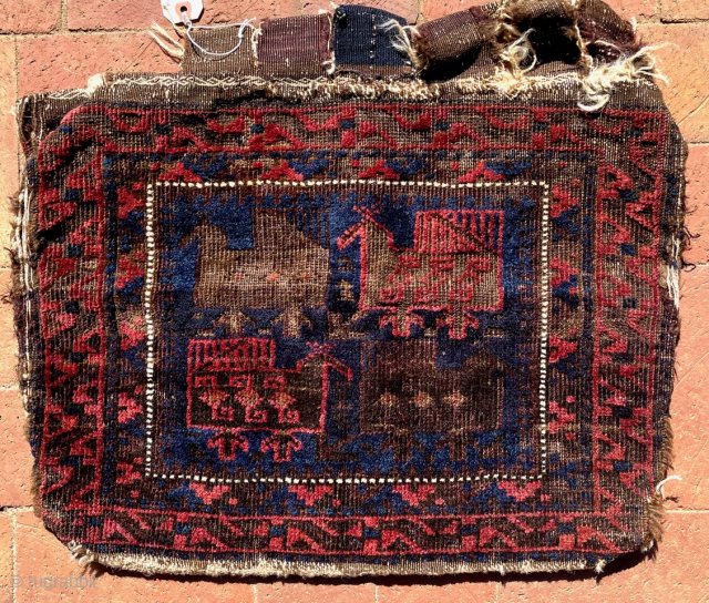 Baluch bird bag, half of what was originally a khorjin (double saddlebag). It was well used in its original ethnographic setting. Looks like it was woven, used, repaired, and used some ...