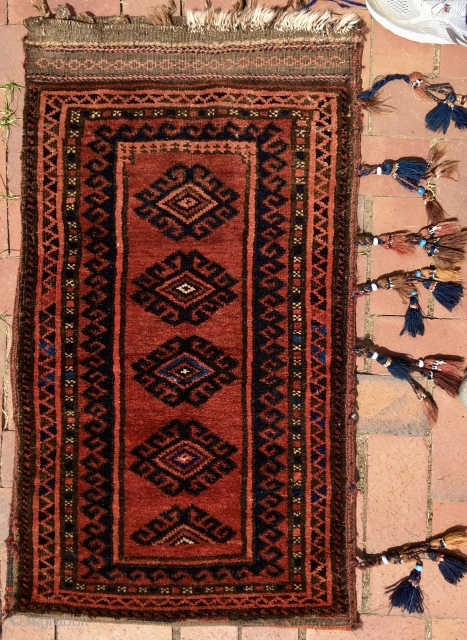 A “Baluch” balisht (bag), complete with its flatwoven back, most likely from the Seistan district of Baluchistan—the region surrounding the point where the Afghanistan-Pakistan border meets the Iranian border.   In  ...