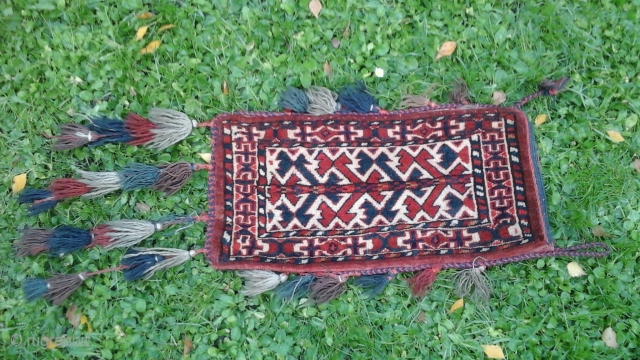 Antique Yomud Yomut Ata-group Igsalyk ,spindlebag in very good condition. Symmetrical knotting, natural colors. Late 19th c. Rare pattern.
Note: the piece has red dyed wefts. No colorrun.
Sizes: 10" x 20"    ...