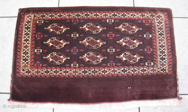 Excellent 19thC Yomud Yomut chuval. It shows a beautiful purple-brown central field. All natural colors, symmetrically knotting. Age: circa 1875. Clean. Lower edge excellent secured. No damages at all.
Size: 2'6" x 4'2"  ...