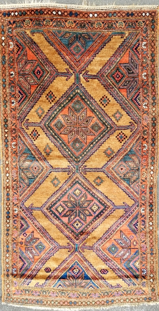Kurdistan - about 3'8" x 7'1". Good pile with shiny wool on camel ground.  One high spot and minor scattered pad remnants on back.        