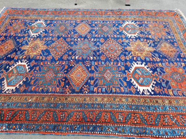 Karadja  -about 7'4" x 10'7".  Nice color and drawing.  Scattered wear throughout and slight mothing one corner (see picture) easily repaired.  Very decorative carpet and complete with original  ...