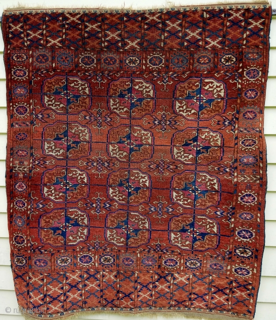 Tekke wedding rug - approximately 48" x 41", great proportions, even wear, couple scattered moth nibbles, interesting skirt embellishments.              