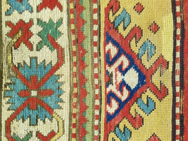 Kazak - about 8.9 x 3.7, Beautiful saturated color, wear areas throughout, newer side cords, overall repiling (mostly of ivory and yellow) and other scattered repairs/reweaves.       