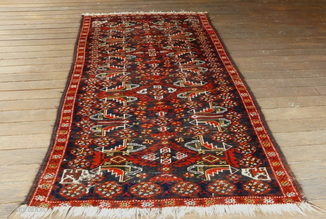 ANTIQUE BALUCH TRIBAL PILE RUG
WESTERN TURKESTAN Circa 1890
EXCELLENT VEGETABLE DYES

      Hand Spun Wool Pile Symmetrically Hand Knotted to Hand Spun, Undyed, IvoryWhite Wool Warps and Hand Spun,  ...