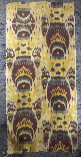 Antique Uzbek silk wrap cotton weft Ikat panel. Good condition natural dyes colours. The size is 65cm by 185cm. Offered reasonable price.           