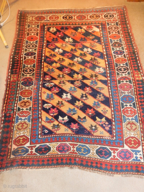 44 x 55 inches 
full pile genge or kazak
with old repairs
best all natural dyes and pile 
today only               