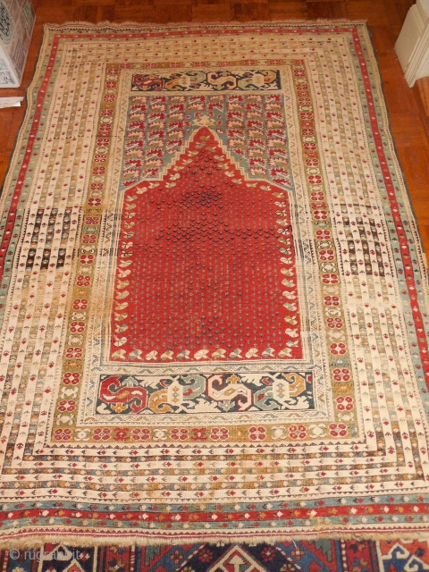 turkish prayer rug  about 4 x5 ft


probably about 120 years old                     