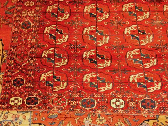 OLD TEKKE MAIN CARPET WITH EXCELLENT PILE OVER 1/2 THE CARPET AND A BIT OF WEAR OVER THE OTHER 1/2 ......1870  WEAVING WITH ONLY 40 GULS ......A RARITY THESE DAYS 
THE  ...