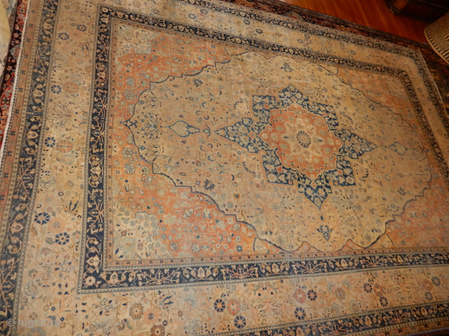 excellent size of 7 1/2 x 10 feet and soft and flexible with no stiffness .or breaking ..has  wear but no foundation showing or holes .....maybe a real mohtashem?   
