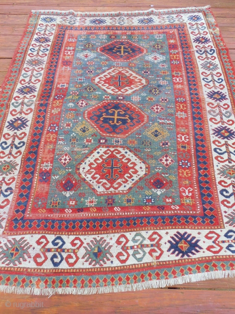 LARGE, 5  1/2 X 7 FOOT KAZAK

NICE BORDER

P.O.R                        