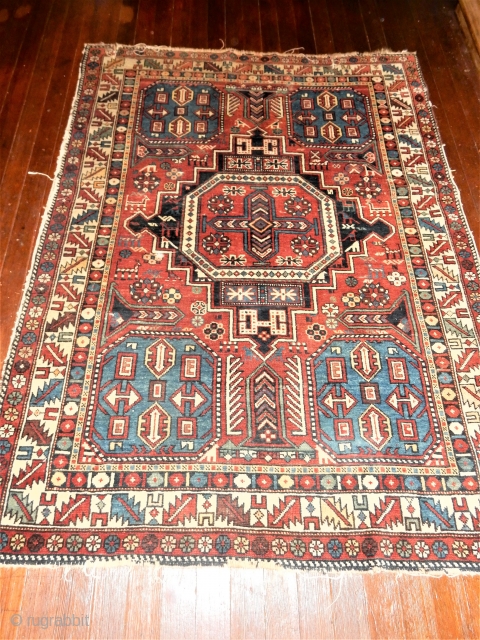 CLASSIC EASTERN CAUCASIAN RUG WITH EXCELLENT PILE WITH NO WORN AREAS - SOME MESSY ENDS AND SIDES BUT 98% COMPLETE -TWO ,3 INCH TEARS ONE END AS SHOW -NO REPAIRS-NO REPILING- 4  ...